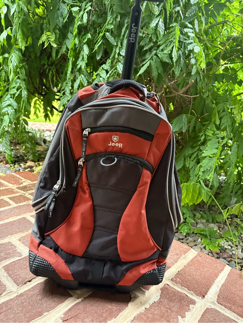 Jeep Rolling Backpack Carry On Luggage in Orange and Black CLEAN Good Condition